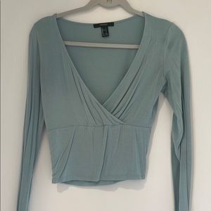 light blue wrap top